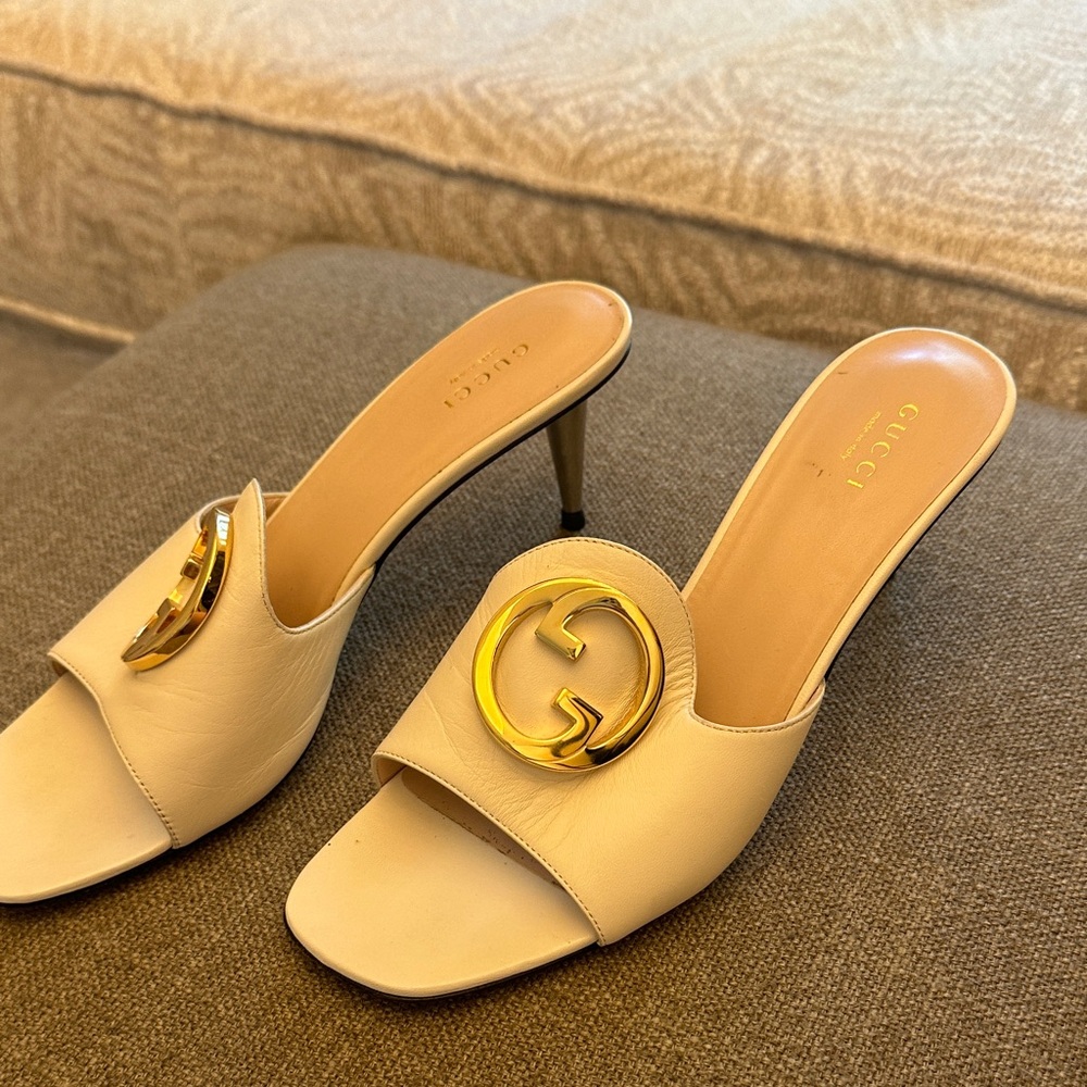 Gucci Cream Heels with Gold Logo Accent